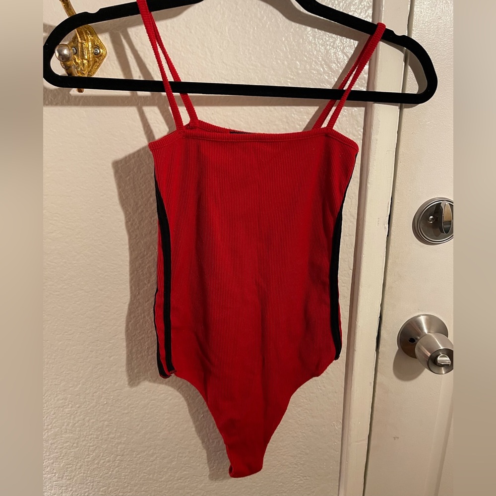 Red Brandy Melville one piece with black side stripes